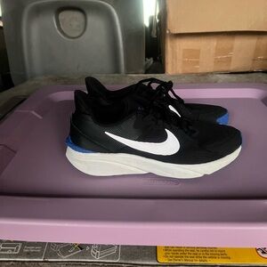 Nike Black and White Running Shoes with Blue Trim